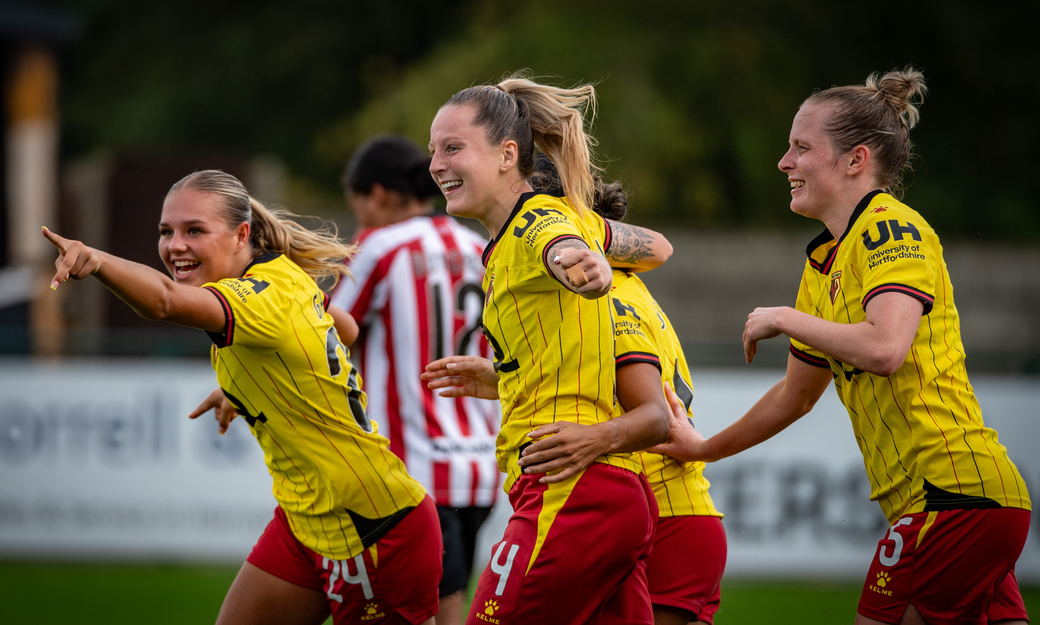 Female players celebrating