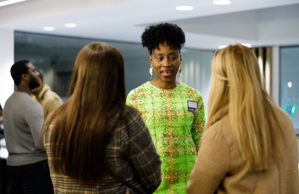 Business woman networking with two other females