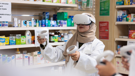 student in pharmacy with vr